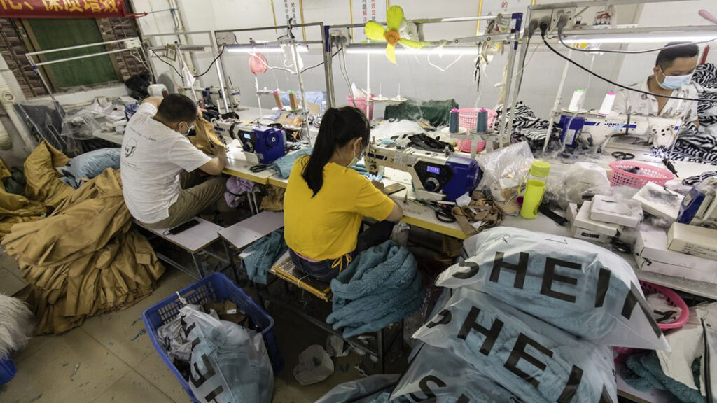 Workers at a company subcontracted by Zoetop Business in Nancun village, Panyu district, China. © Panos Pictures / Public Eye.